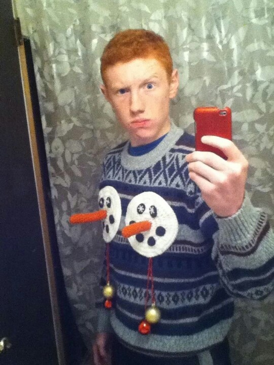 redhead ugly holiday sweater selfie