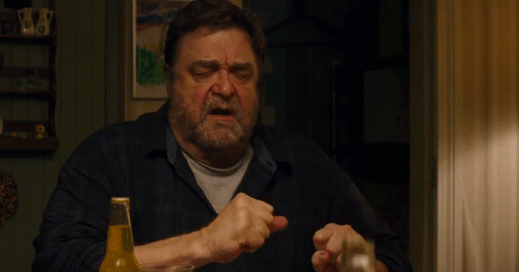 john goodman 10 cloverfield lane dinner table
