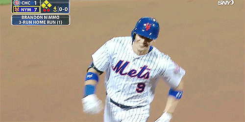 New York Mets outfielder Brandon Nimmo smiles as he circles the bases following a home run against the Chicago Cubs.